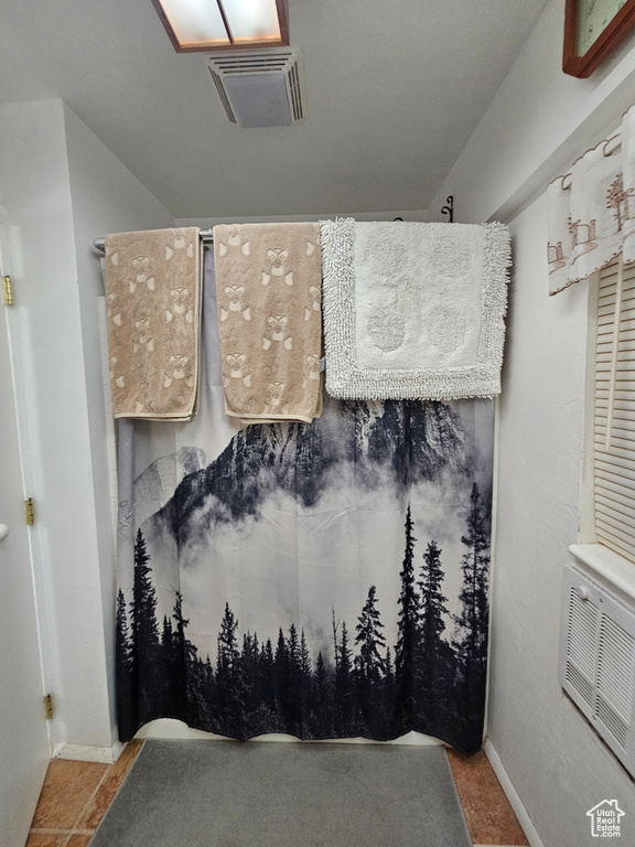 Bathroom featuring baseboards