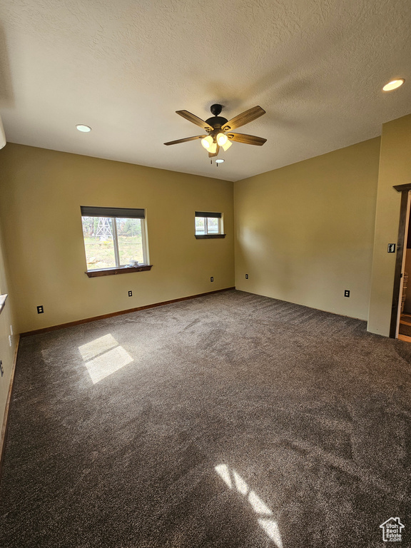 Unfurnished room with carpet flooring, a ceiling fan, recessed lighting, and a textured ceiling
