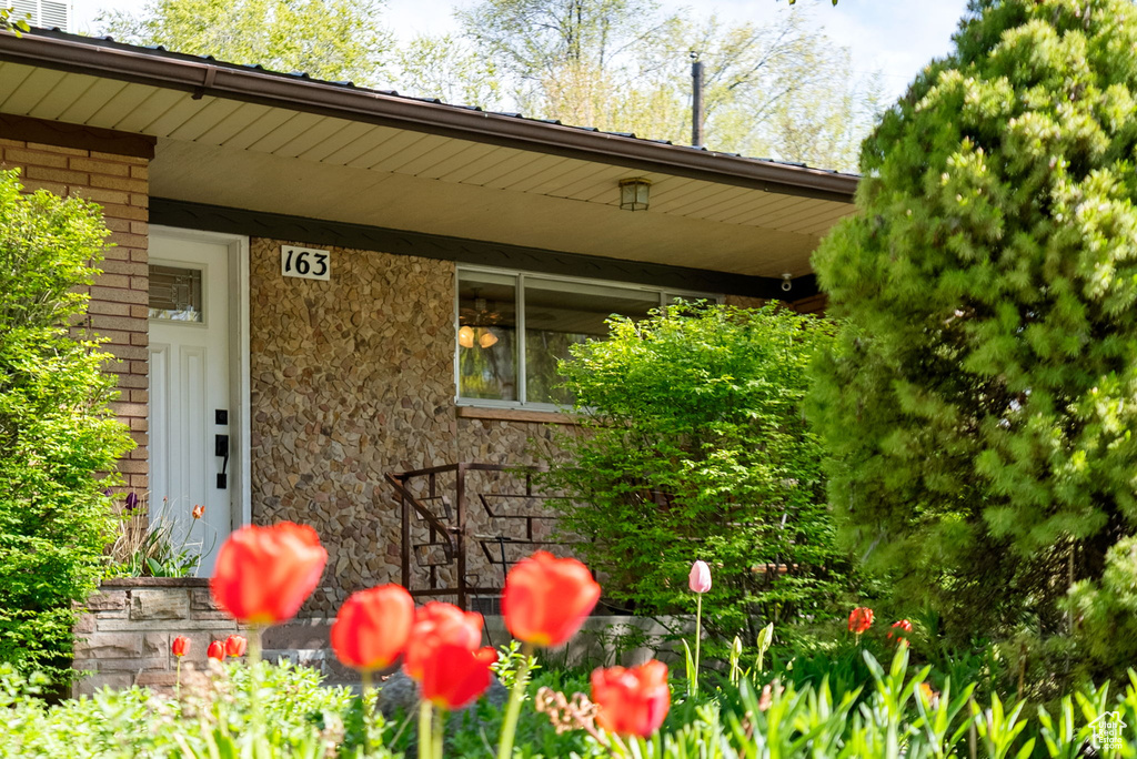 Property entrance with brick siding