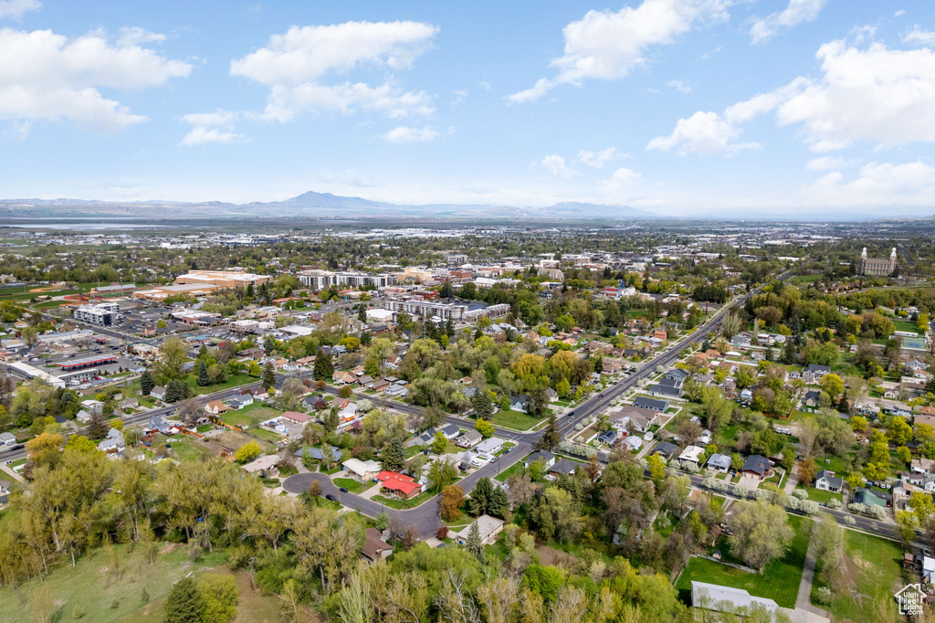Birds eye view of property with a mountain view