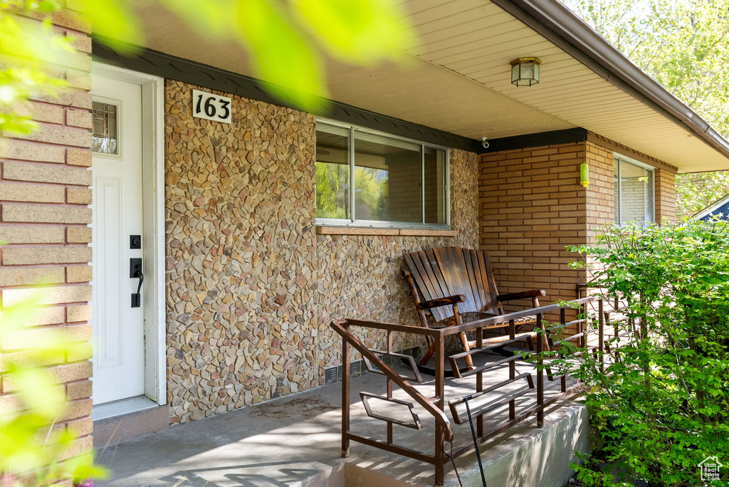 View of patio featuring covered porch