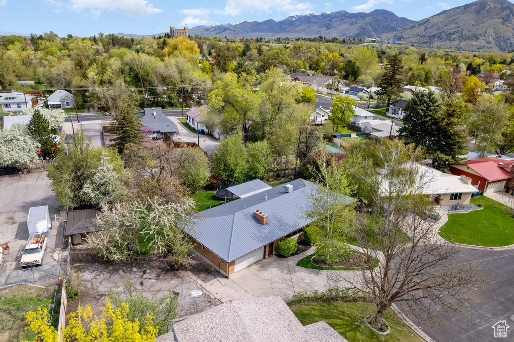 Birds eye view of property featuring a residential view and a mountain view