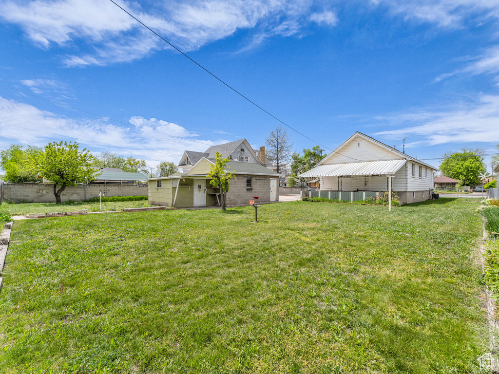 View of yard with fence