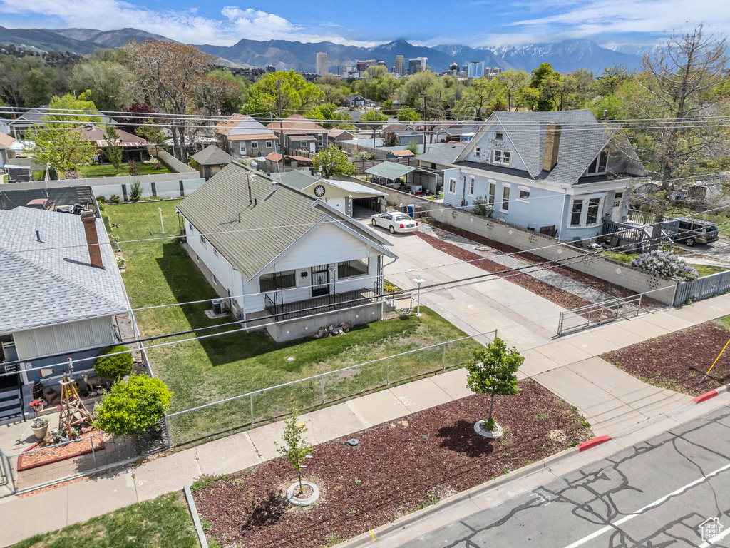 Birds eye view of property featuring a residential view and a mountain view
