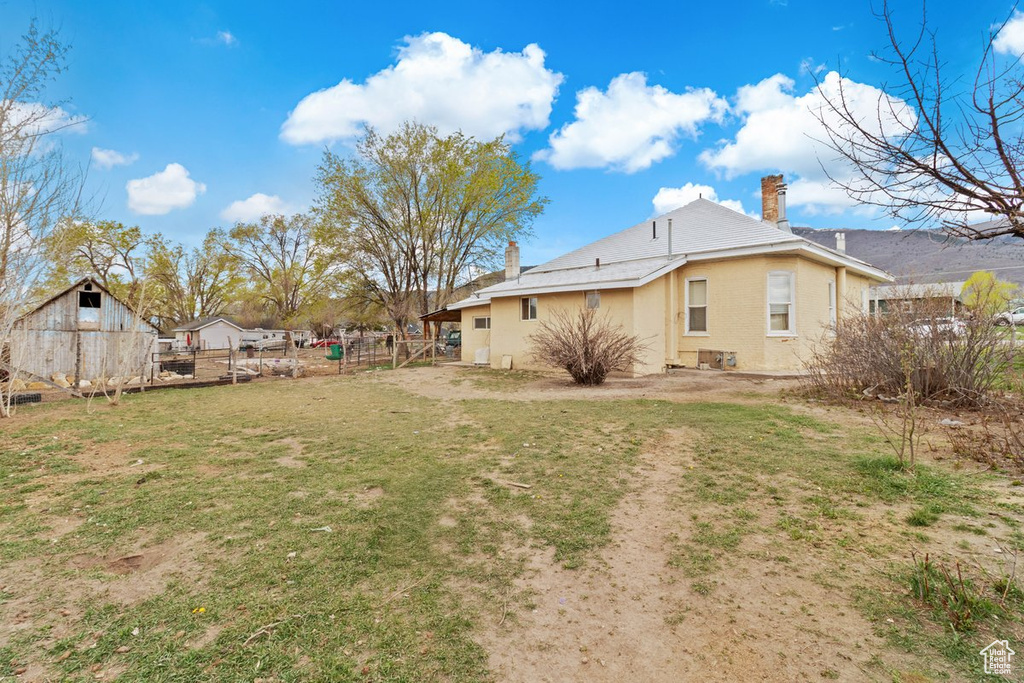 View of yard with fence