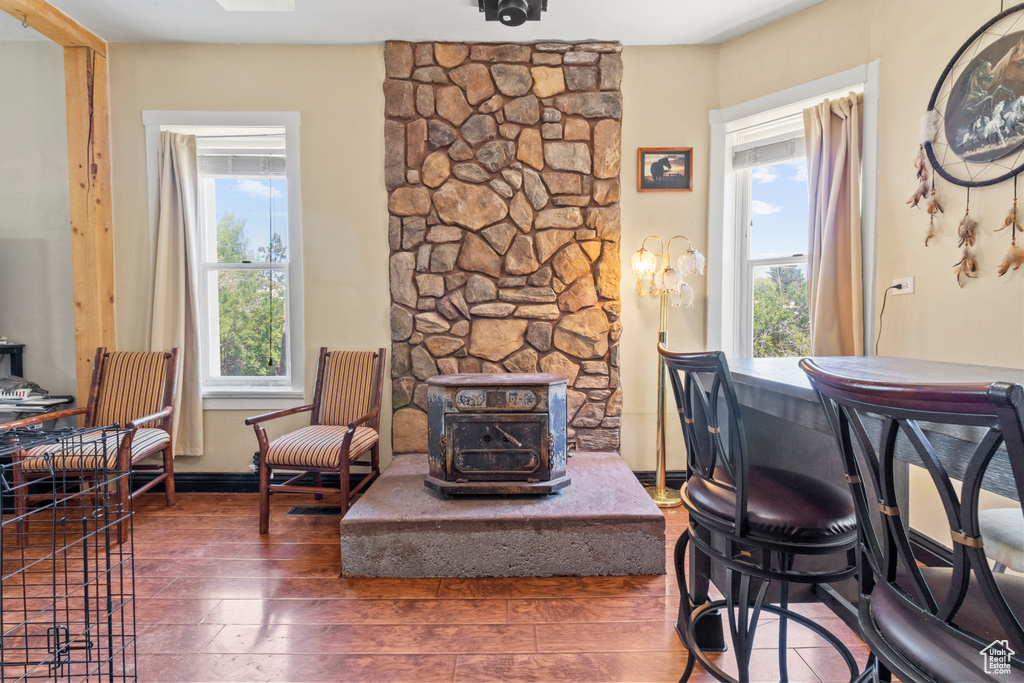 Living room with healthy amount of natural light and wood-type flooring