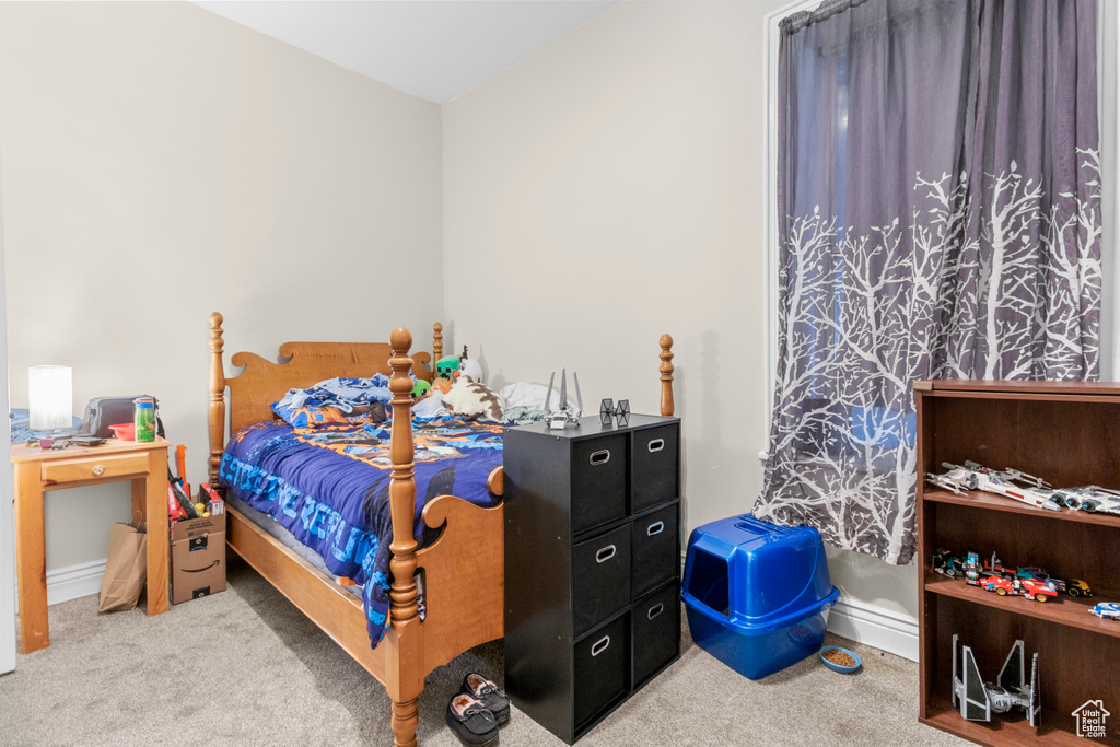 Bedroom featuring carpet flooring