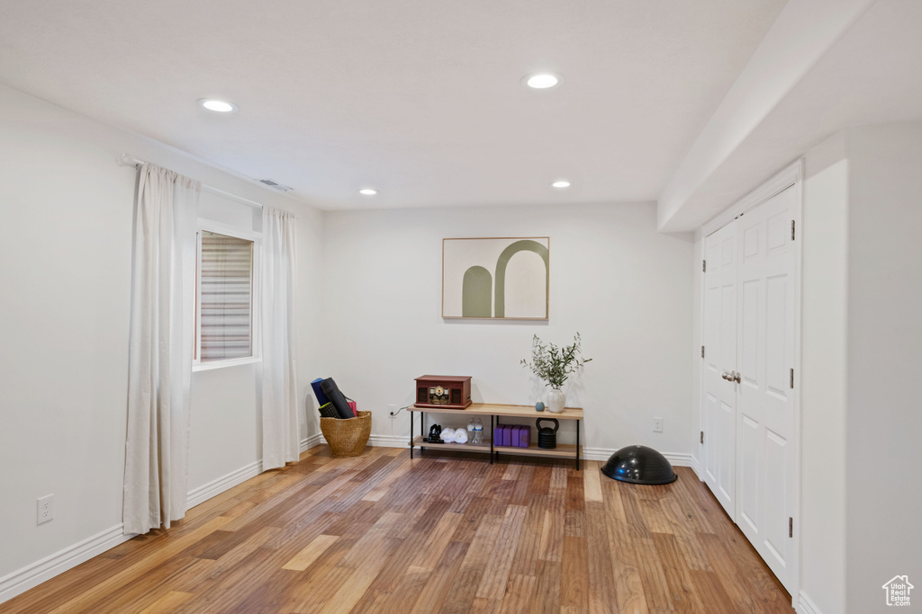 Entrance foyer featuring light wood-style flooring, recessed lighting, and baseboards