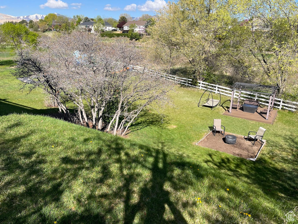 View of yard featuring fence