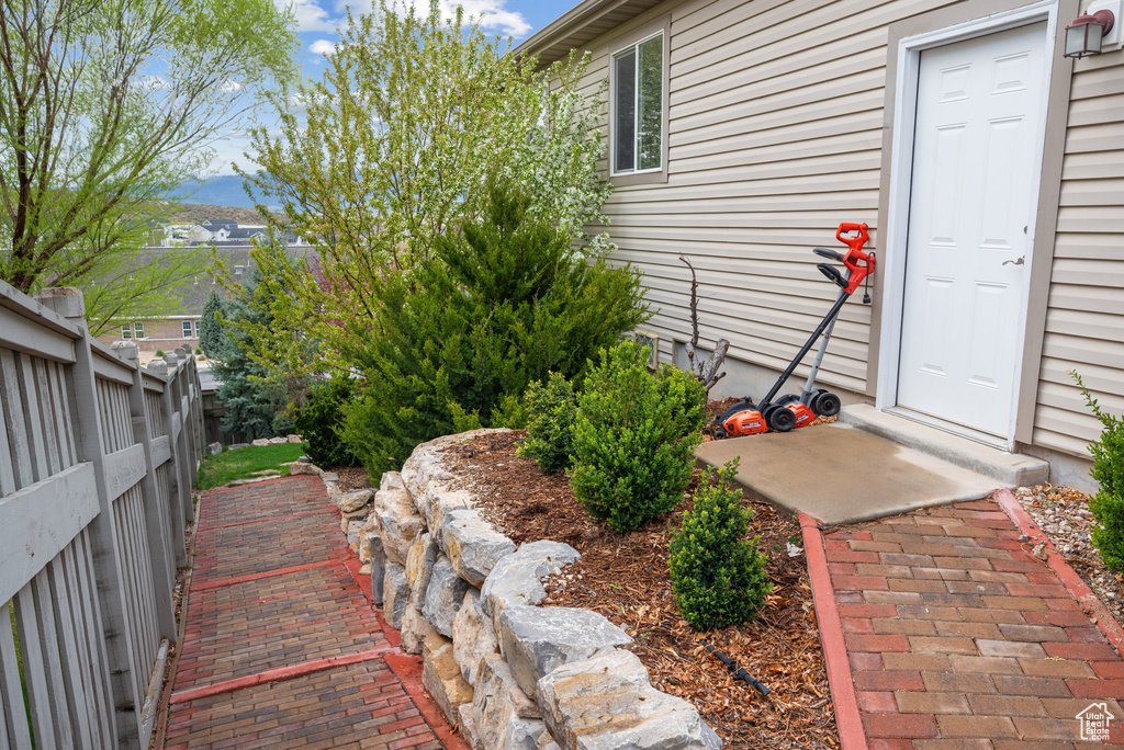 View of yard featuring fence
