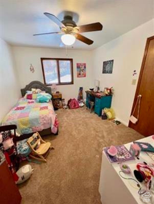 Bedroom with carpet floors and ceiling fan