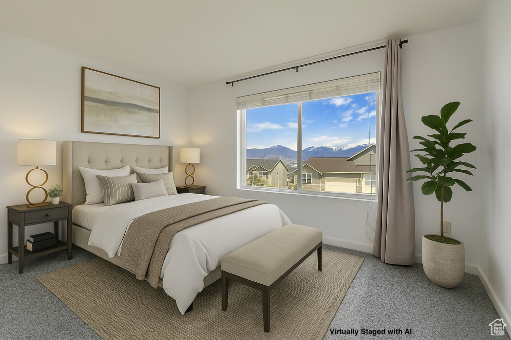 Bedroom featuring baseboards and a mountain view