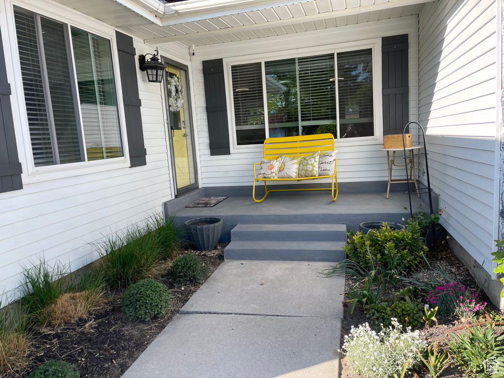 Entrance to property with a porch