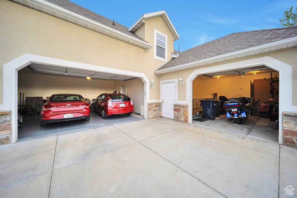 Garage with concrete driveway