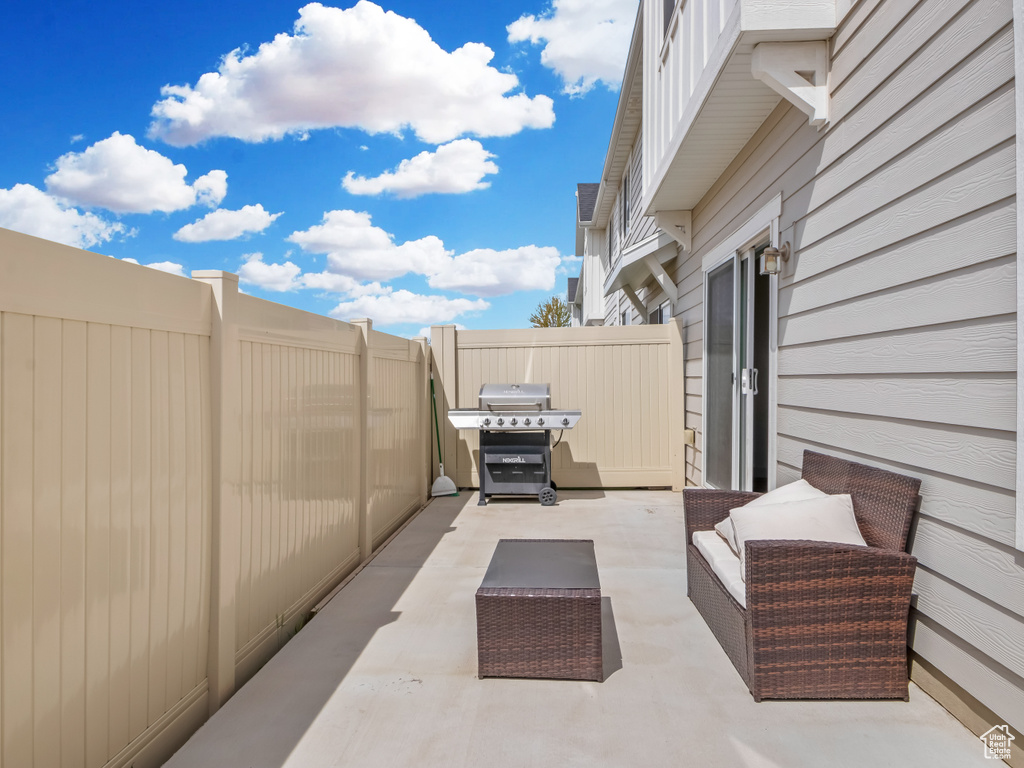 View of patio / terrace featuring fence and grilling area