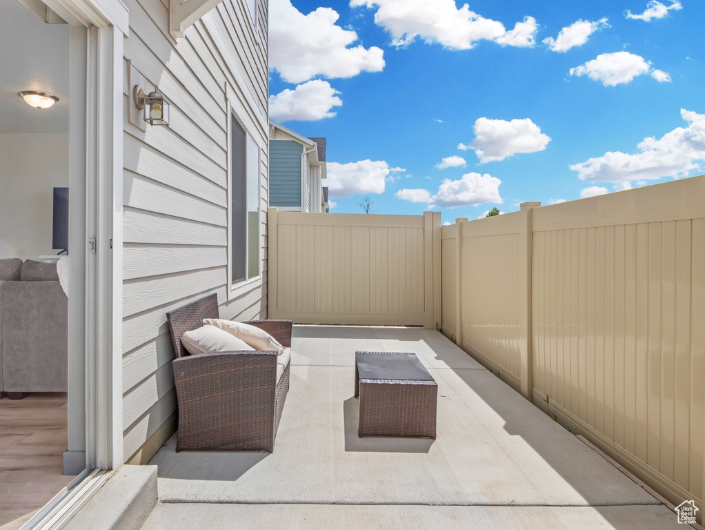 View of patio / terrace featuring fence