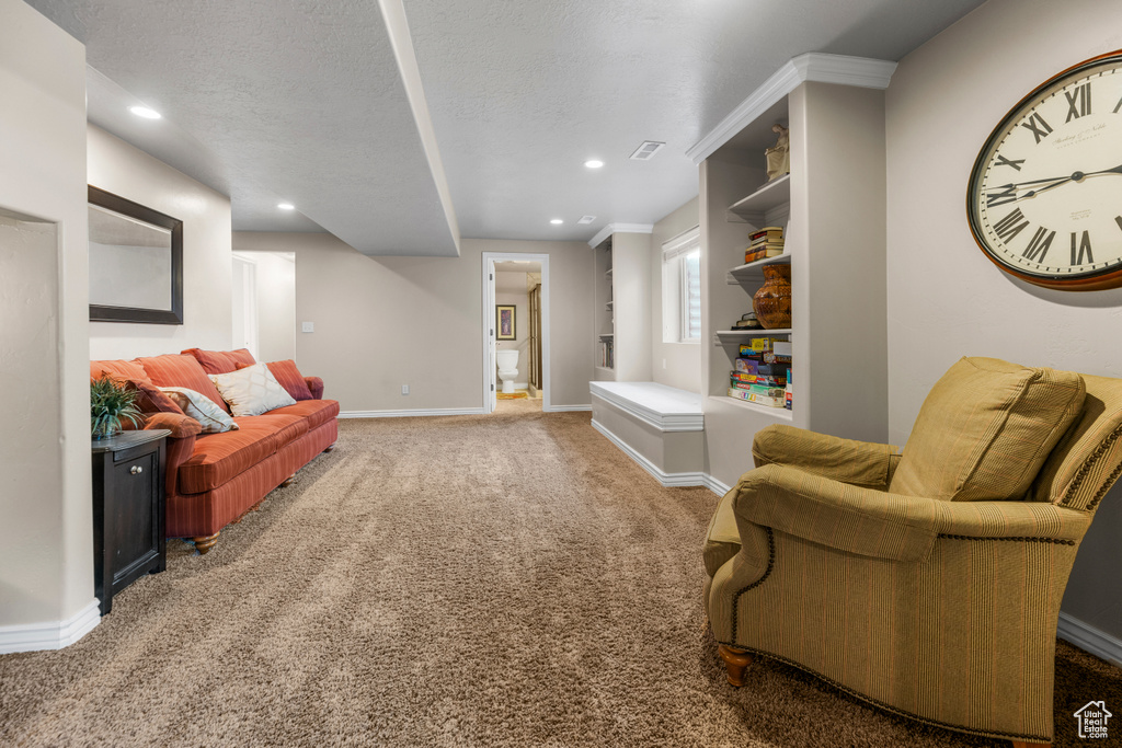 Living room featuring baseboards, carpet, recessed lighting, and visible vents