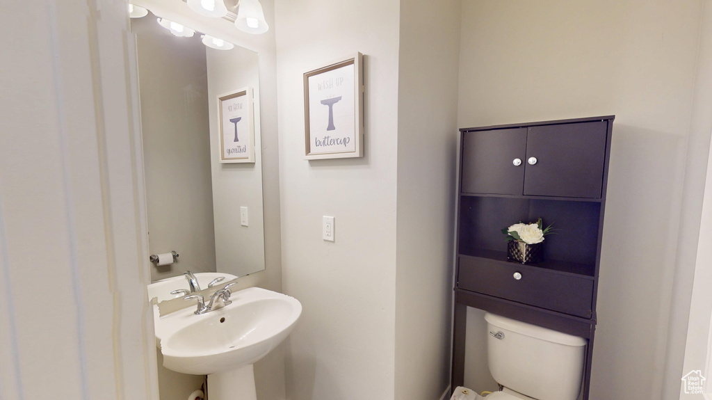 Bathroom with a sink and toilet