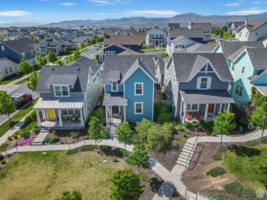 Aerial view of residential area featuring mountains