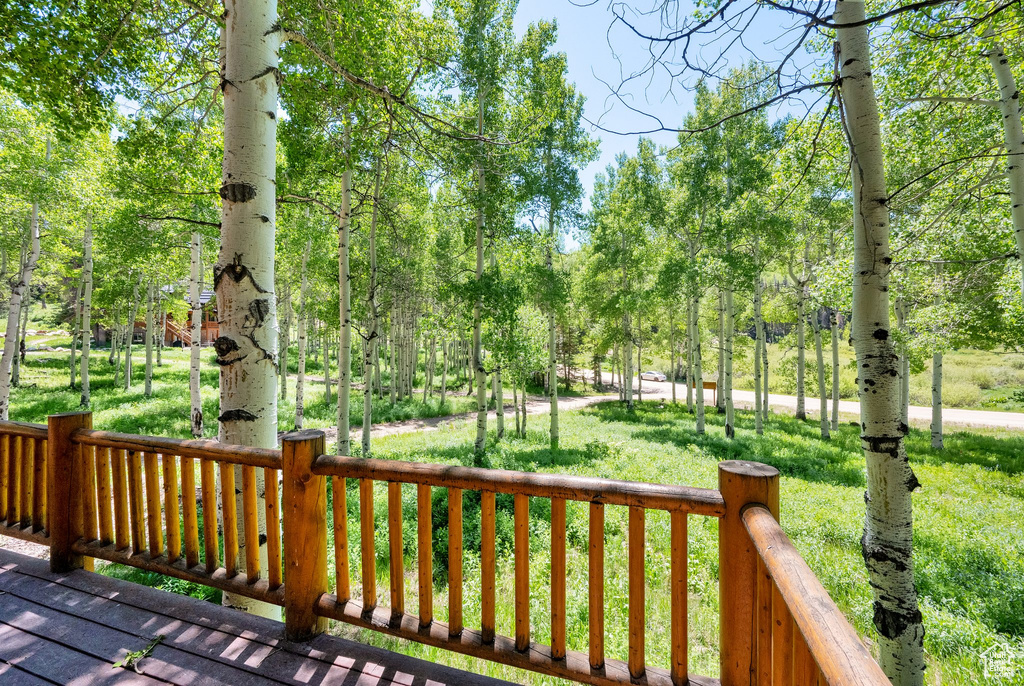 Deck with view of scattered trees
