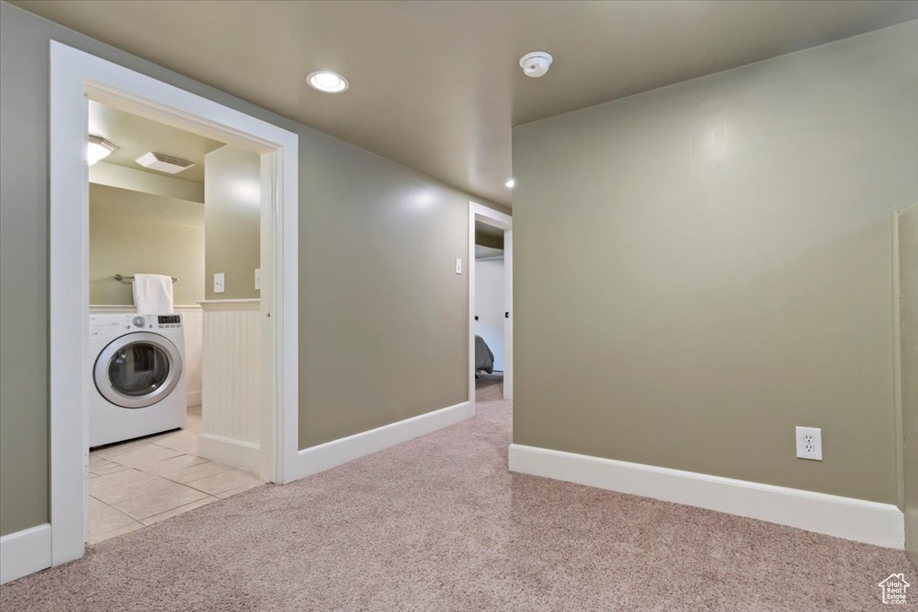 Laundry area featuring laundry area, washer / clothes dryer, carpet floors, tile patterned floors, and recessed lighting