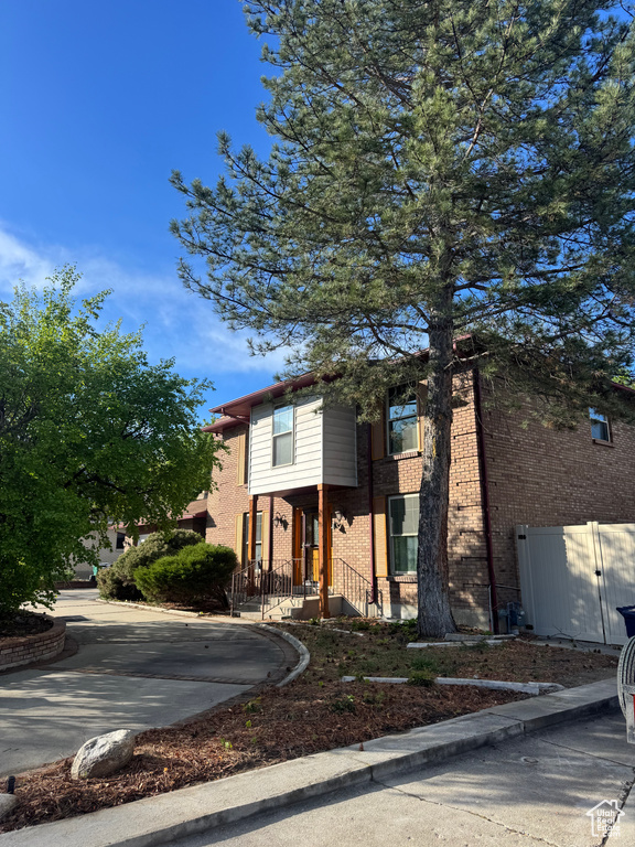 View of front of house featuring brick siding