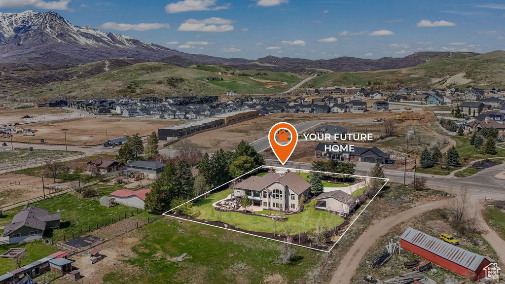 Aerial view featuring a residential view and a mountain view