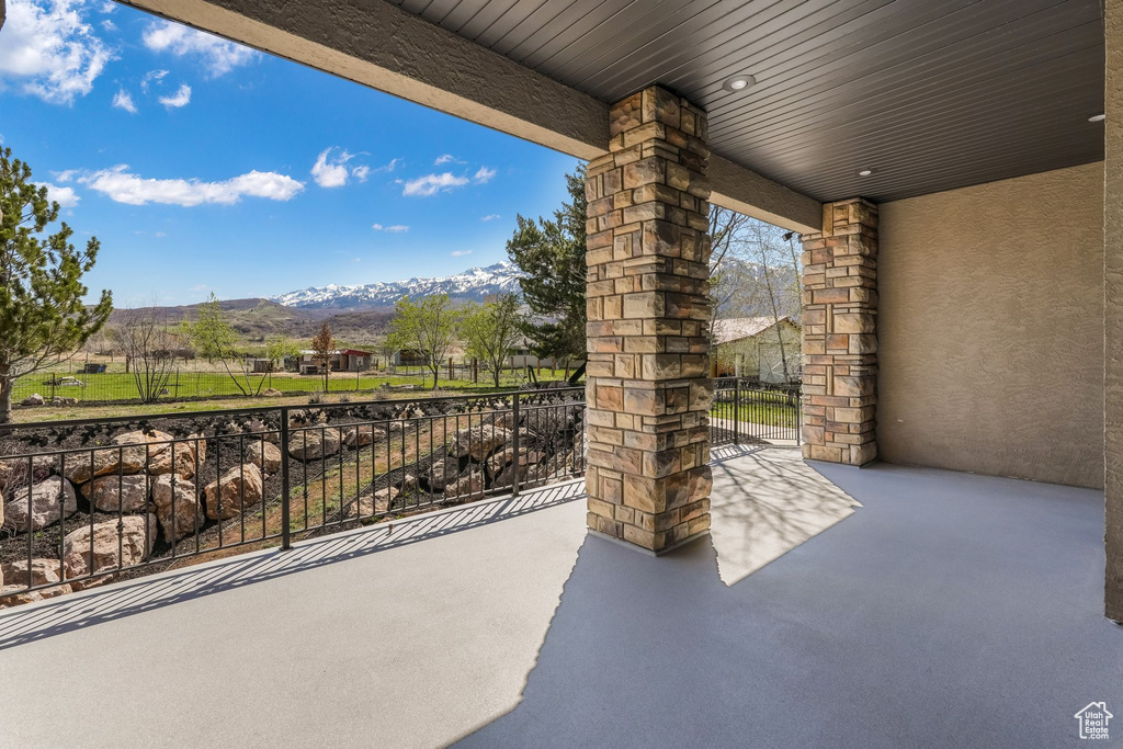 View of patio featuring a mountain view