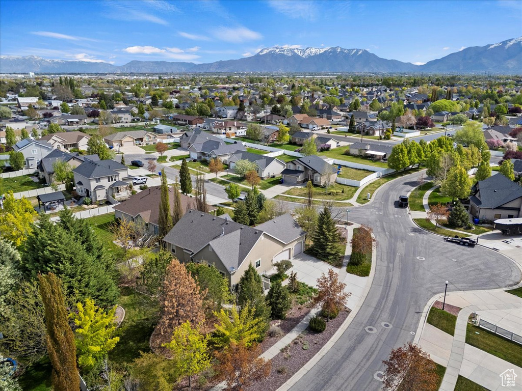Birds eye view of property featuring a mountain view and a residential view