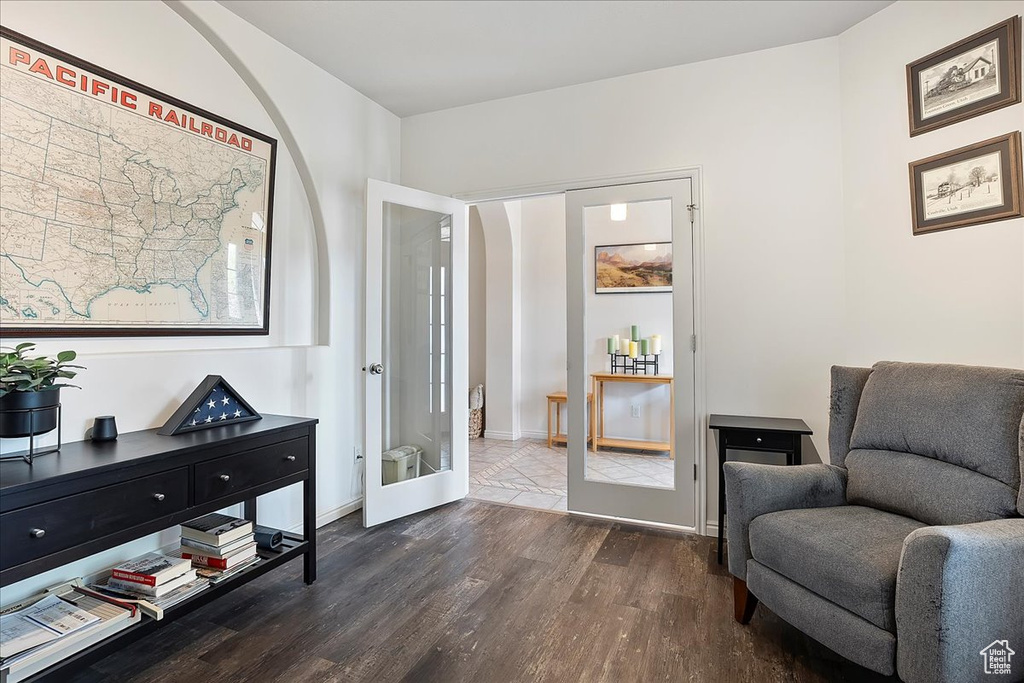 Living area with dark wood-style flooring