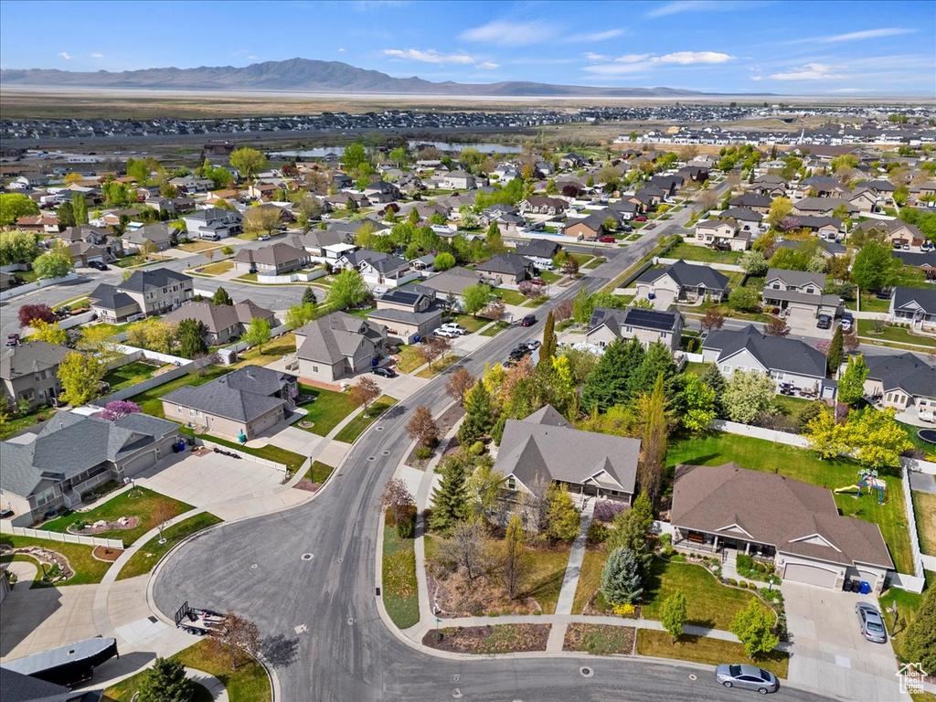 Birds eye view of property featuring a mountain view and a residential view
