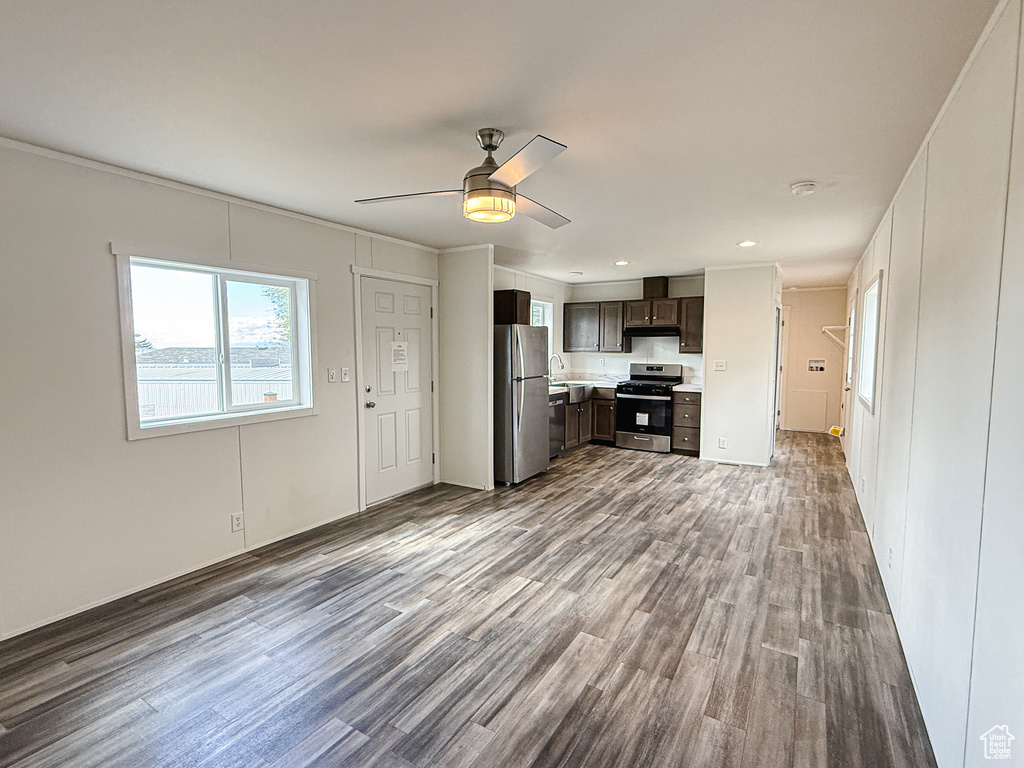 Unfurnished living room featuring recessed lighting, wood finished floors, and ceiling fan