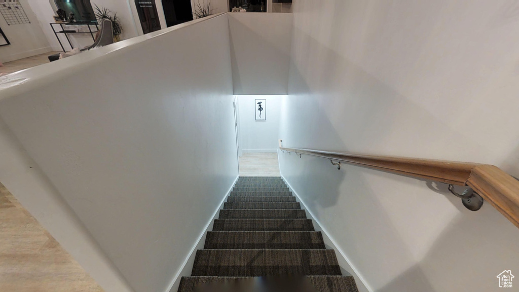 Stairway featuring baseboards