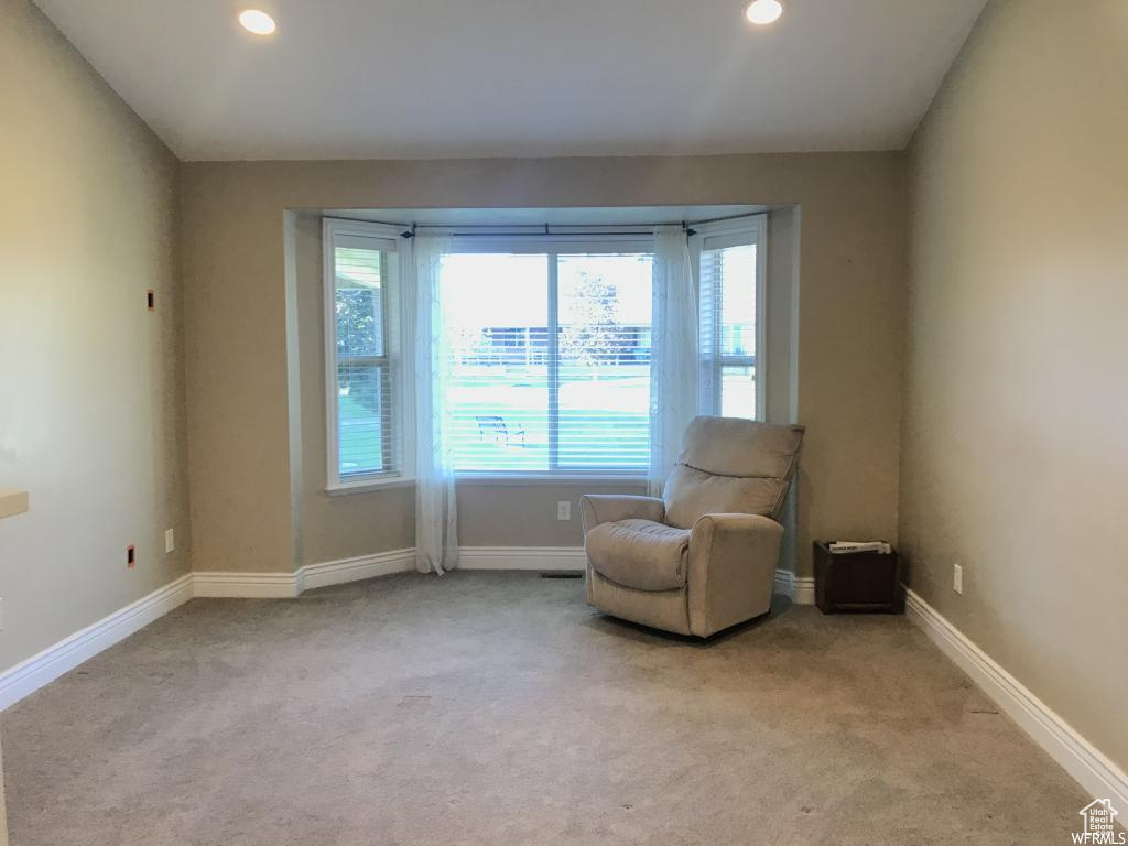 Unfurnished room with recessed lighting, carpet, and baseboards