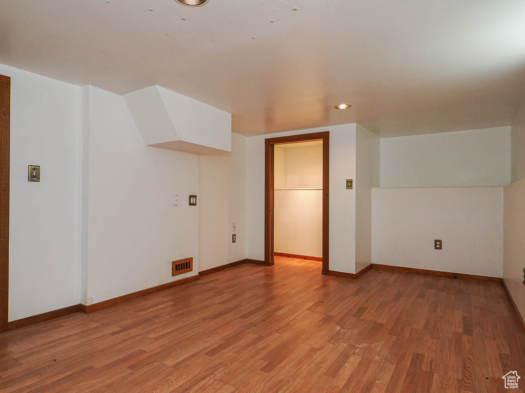 Bonus room with visible vents, recessed lighting, baseboards, and light wood-type flooring