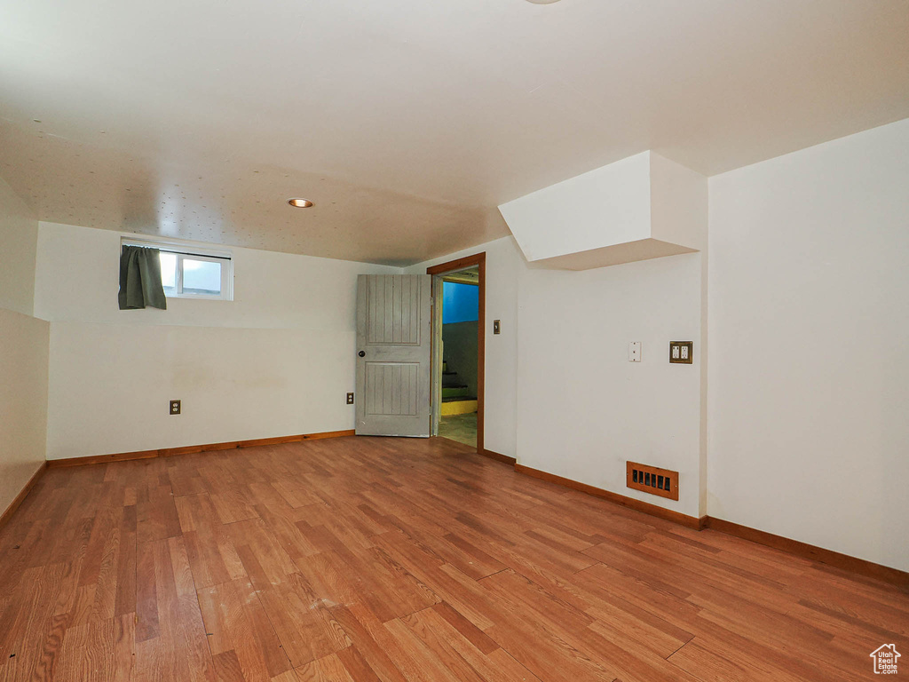 Bonus room featuring recessed lighting, baseboards, visible vents, and light wood-type flooring