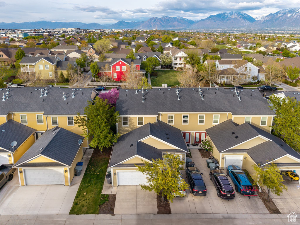 Birds eye view of property featuring a residential view and a mountain view