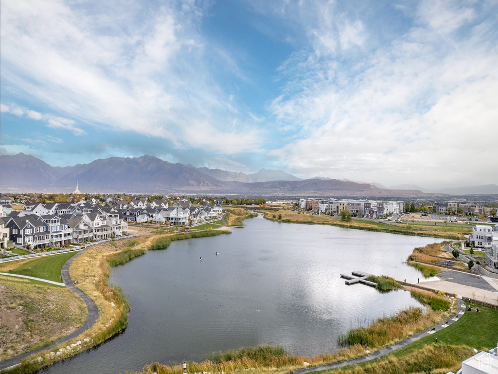 View of water feature featuring a mountain view and a residential view