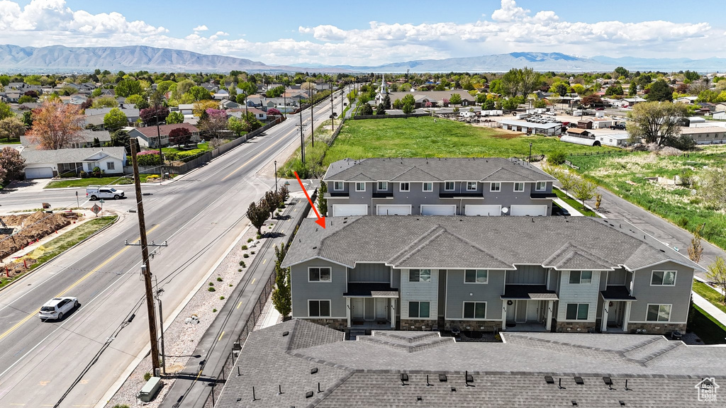 Drone / aerial view featuring a residential view and a mountain view