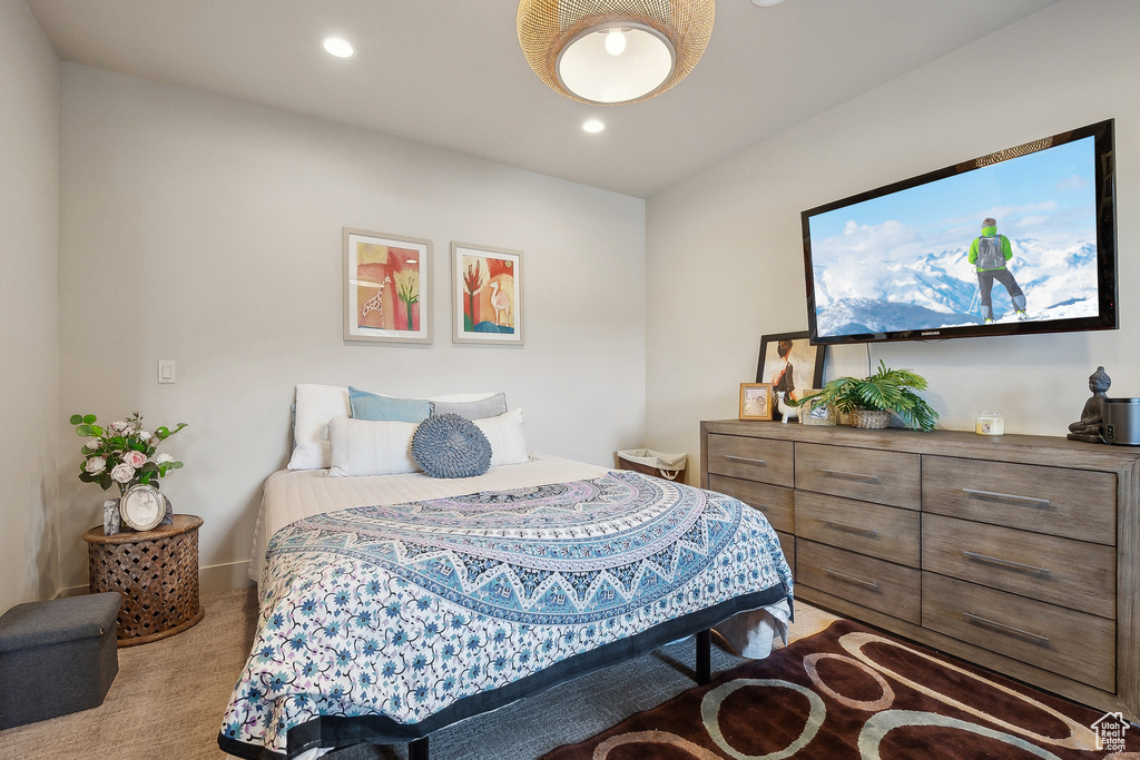 Bedroom with recessed lighting and carpet