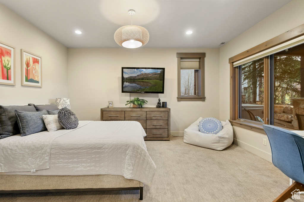Bedroom with baseboards, recessed lighting, and carpet