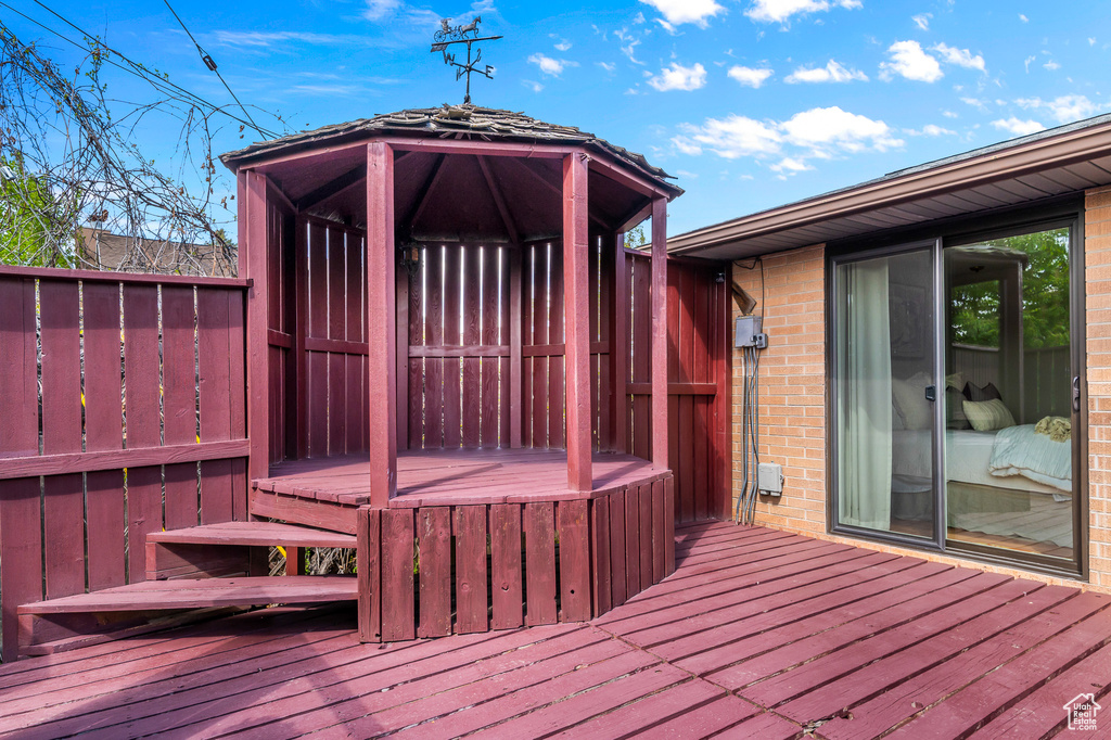 Wooden deck with a hot tub