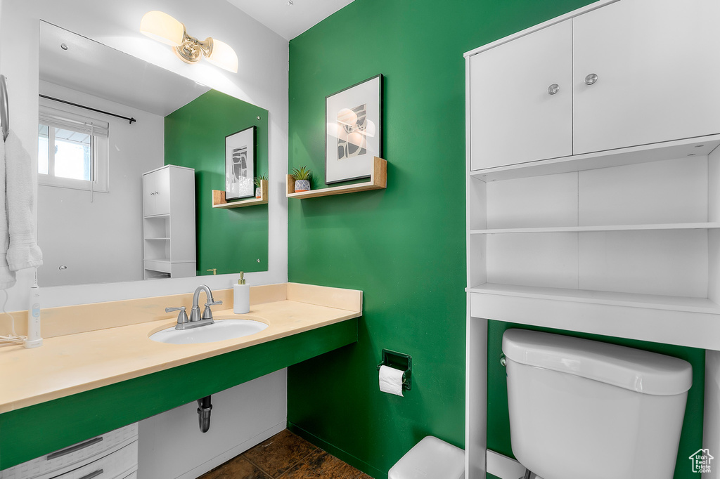 Bathroom with a sink and toilet