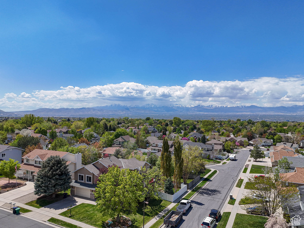 Drone / aerial view featuring a mountain view and a residential view