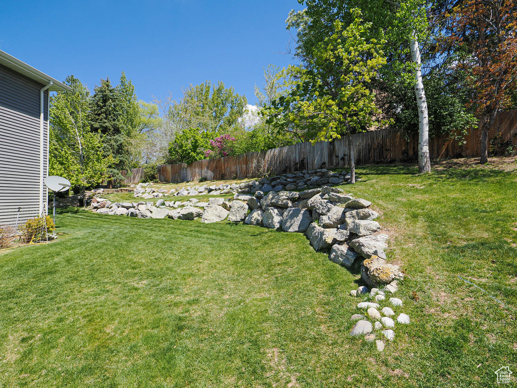 View of yard with fence