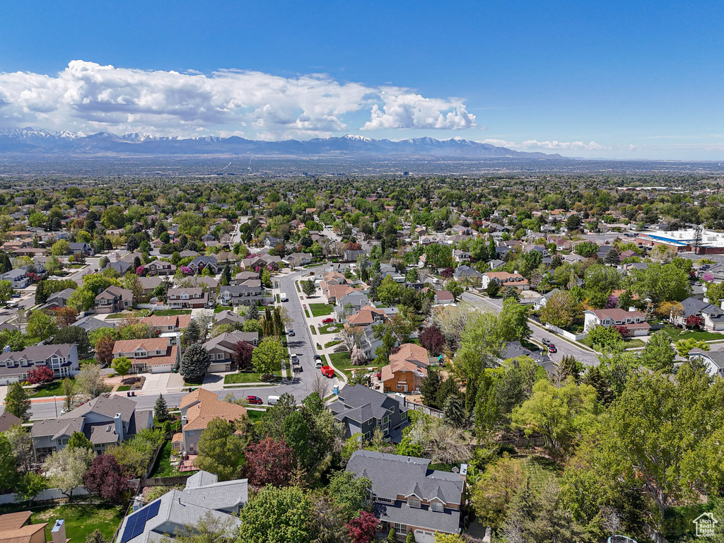 Drone / aerial view with a residential view and a mountain view