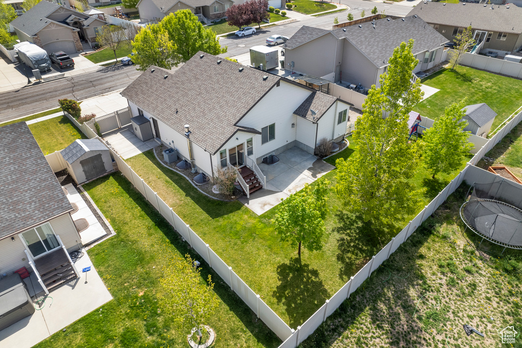 Birds eye view of property with a residential view