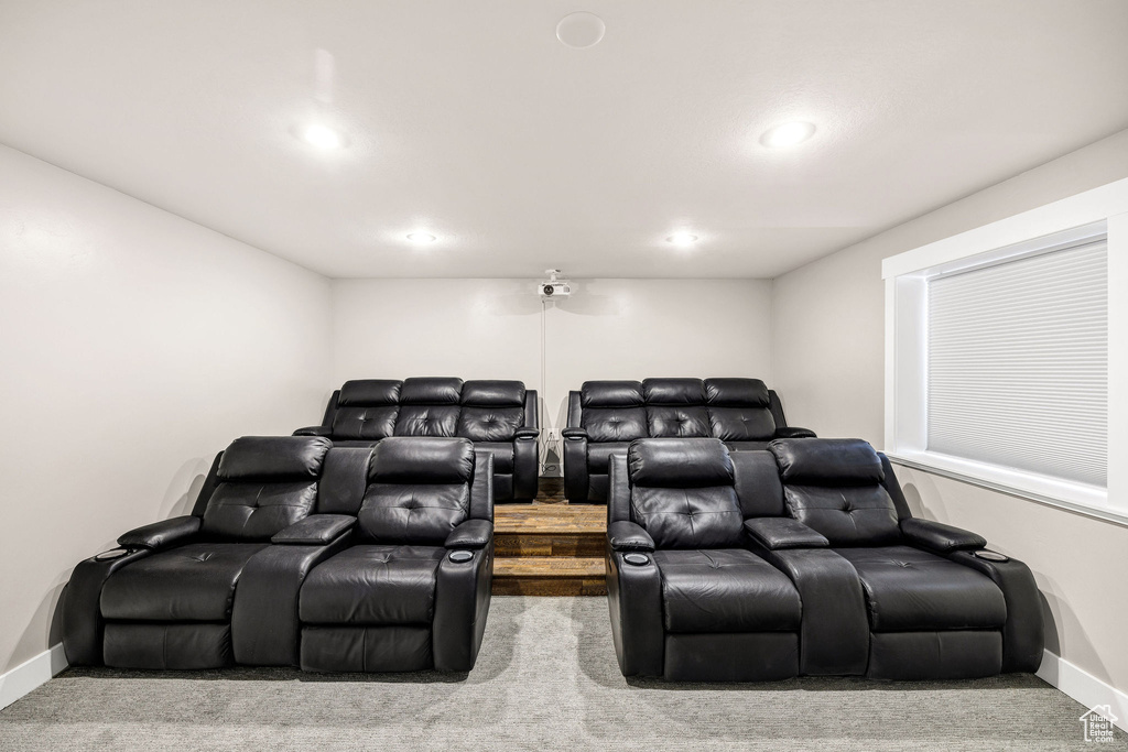 Cinema room with carpet floors, recessed lighting, and baseboards