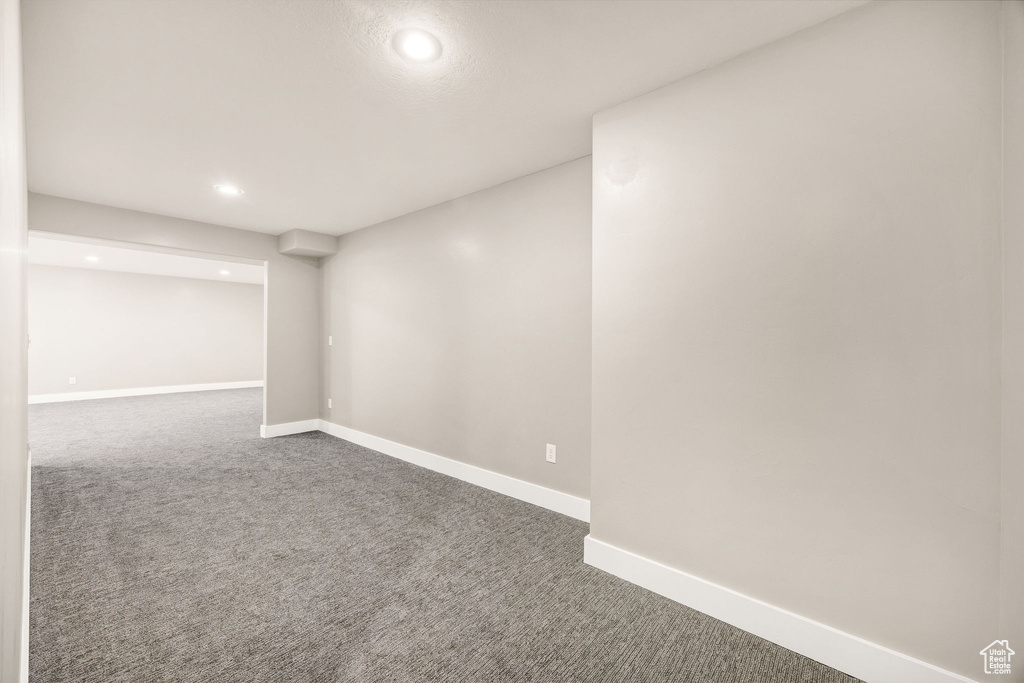 Finished basement featuring recessed lighting, baseboards, and carpet floors