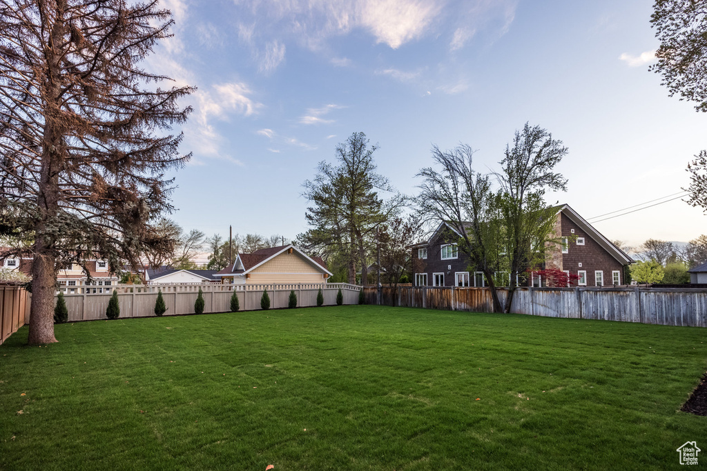 View of yard featuring a fenced backyard